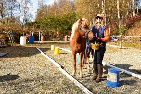 Cluadia and her young horse Fonix